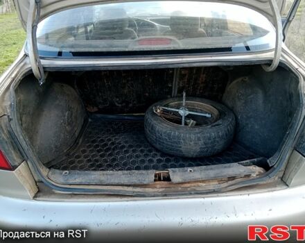 Бежевый Дэу Ланос, объемом двигателя 1.5 л и пробегом 208 тыс. км за 1300 $, фото 8 на Automoto.ua