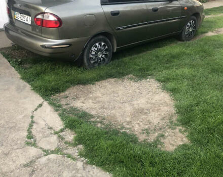 Бежевый Дэу Ланос, объемом двигателя 1.39 л и пробегом 155 тыс. км за 3200 $, фото 2 на Automoto.ua