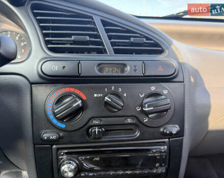 Бежевий Деу Ланос, об'ємом двигуна 1.5 л та пробігом 70 тис. км за 3900 $, фото 10 на Automoto.ua