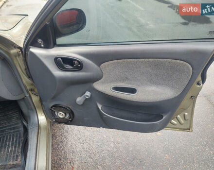 Бежевый Дэу Ланос, объемом двигателя 1.5 л и пробегом 177 тыс. км за 2000 $, фото 11 на Automoto.ua