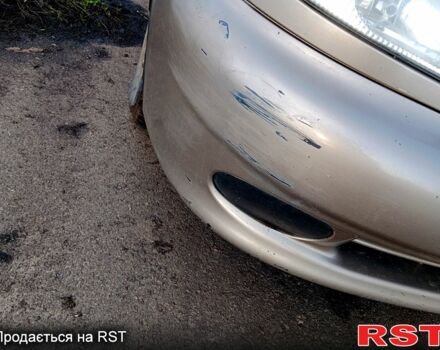 Бежевый Дэу Ланос, объемом двигателя 1.5 л и пробегом 208 тыс. км за 1300 $, фото 9 на Automoto.ua