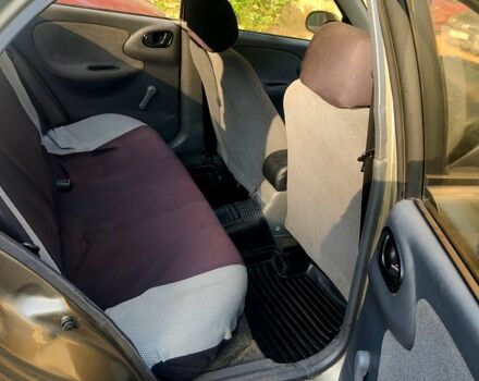 Бежевый Дэу Ланос, объемом двигателя 1.4 л и пробегом 200 тыс. км за 1700 $, фото 7 на Automoto.ua