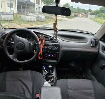 Бежевий Деу Ланос, об'ємом двигуна 1.5 л та пробігом 140 тис. км за 1850 $, фото 8 на Automoto.ua