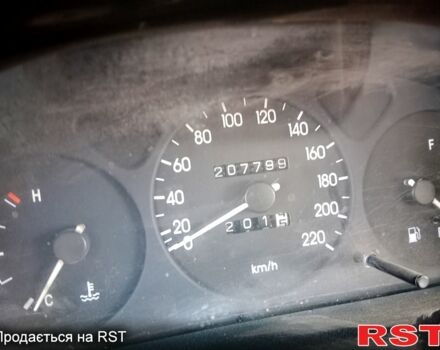 Бежевый Дэу Ланос, объемом двигателя 1.5 л и пробегом 208 тыс. км за 1300 $, фото 1 на Automoto.ua