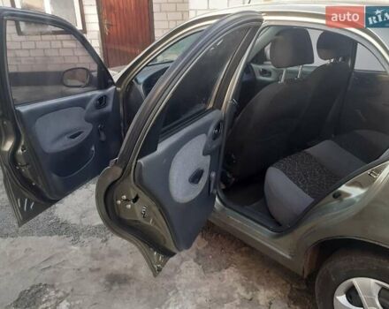 Бежевый Дэу Ланос, объемом двигателя 1.5 л и пробегом 300 тыс. км за 2150 $, фото 3 на Automoto.ua