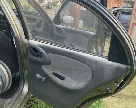 Бежевый Дэу Ланос, объемом двигателя 1.39 л и пробегом 226 тыс. км за 800 $, фото 13 на Automoto.ua