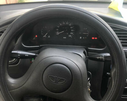 Бежевый Дэу Ланос, объемом двигателя 1.39 л и пробегом 155 тыс. км за 3200 $, фото 5 на Automoto.ua