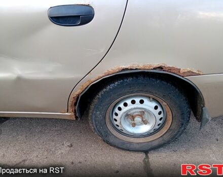 Бежевый Дэу Ланос, объемом двигателя 1.5 л и пробегом 208 тыс. км за 1300 $, фото 13 на Automoto.ua