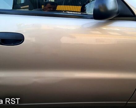 Бежевый Дэу Ланос, объемом двигателя 1.5 л и пробегом 170 тыс. км за 2200 $, фото 6 на Automoto.ua