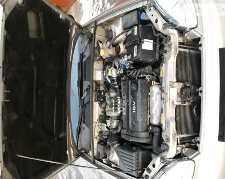 Бежевий Деу Ланос, об'ємом двигуна 1.6 л та пробігом 215 тис. км за 3000 $, фото 12 на Automoto.ua