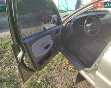 Бежевый Дэу Ланос, объемом двигателя 1.5 л и пробегом 325 тыс. км за 1500 $, фото 1 на Automoto.ua