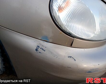 Бежевый Дэу Ланос, объемом двигателя 1.5 л и пробегом 208 тыс. км за 1300 $, фото 7 на Automoto.ua