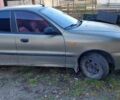 Бежевый Дэу Ланос, объемом двигателя 1.5 л и пробегом 185 тыс. км за 2200 $, фото 2 на Automoto.ua