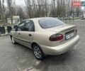 Бежевий Деу Ланос, об'ємом двигуна 1.5 л та пробігом 172 тис. км за 1750 $, фото 2 на Automoto.ua