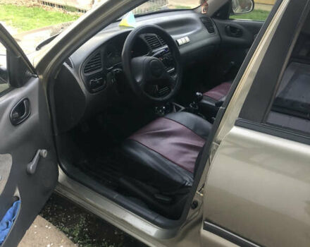 Бежевый Дэу Ланос, объемом двигателя 1.39 л и пробегом 155 тыс. км за 3200 $, фото 6 на Automoto.ua