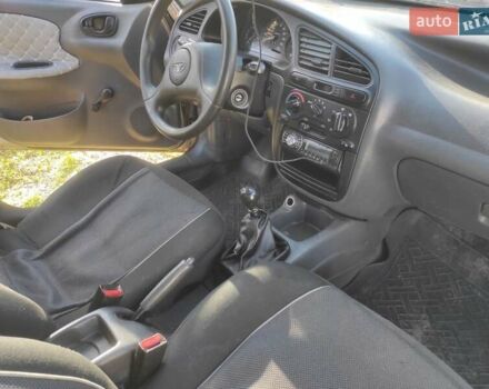 Бежевый Дэу Ланос, объемом двигателя 1.5 л и пробегом 325 тыс. км за 1500 $, фото 4 на Automoto.ua