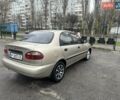 Бежевий Деу Ланос, об'ємом двигуна 1.5 л та пробігом 172 тис. км за 1750 $, фото 1 на Automoto.ua