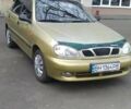 Бежевий Деу Ланос, об'ємом двигуна 1.6 л та пробігом 159 тис. км за 3000 $, фото 1 на Automoto.ua