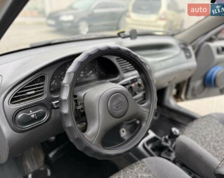 Бежевий Деу Ланос, об'ємом двигуна 1.5 л та пробігом 224 тис. км за 2550 $, фото 14 на Automoto.ua