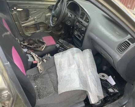 Бежевый Дэу Ланос, объемом двигателя 1.39 л и пробегом 226 тыс. км за 800 $, фото 15 на Automoto.ua