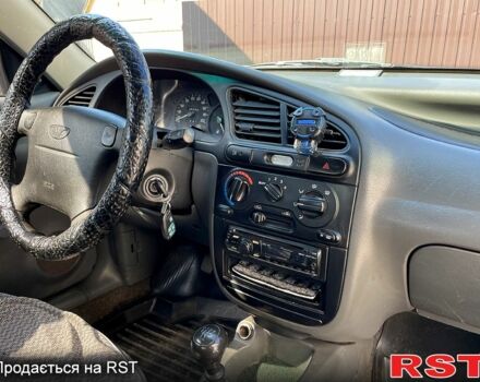 Бежевый Дэу Ланос, объемом двигателя 1.5 л и пробегом 186 тыс. км за 2750 $, фото 12 на Automoto.ua