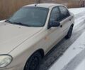 Бежевый Дэу Ланос, объемом двигателя 1.4 л и пробегом 212 тыс. км за 2000 $, фото 1 на Automoto.ua
