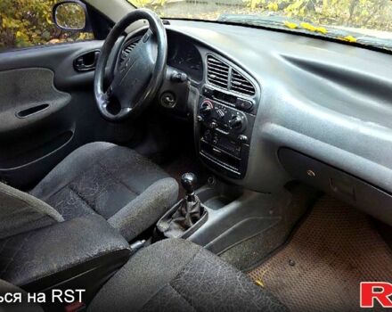 Бежевий Деу Ланос, об'ємом двигуна 1.6 л та пробігом 273 тис. км за 800 $, фото 5 на Automoto.ua