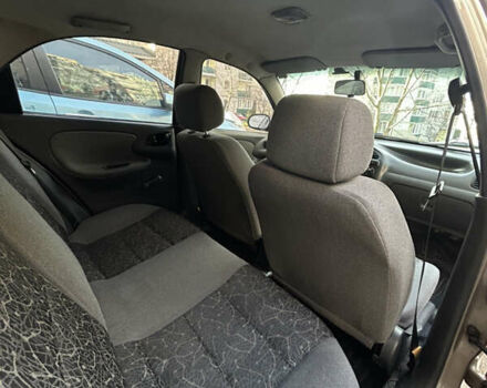 Бежевый Дэу Ланос, объемом двигателя 1.5 л и пробегом 300 тыс. км за 1950 $, фото 7 на Automoto.ua