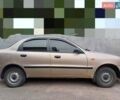 Бежевый Дэу Ланос, объемом двигателя 1.39 л и пробегом 150 тыс. км за 1800 $, фото 1 на Automoto.ua
