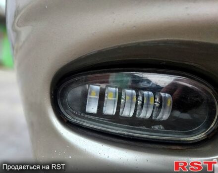 Бежевый Дэу Ланос, объемом двигателя 1.5 л и пробегом 220 тыс. км за 2750 $, фото 5 на Automoto.ua