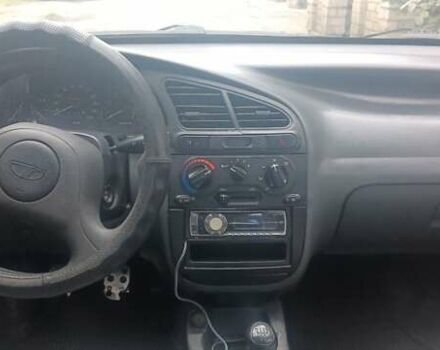 Бежевый Дэу Ланос, объемом двигателя 1.5 л и пробегом 277 тыс. км за 2100 $, фото 6 на Automoto.ua