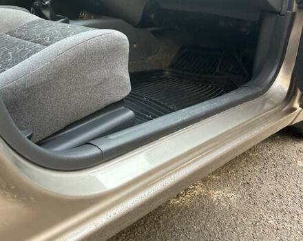 Бежевый Дэу Ланос, объемом двигателя 1.5 л и пробегом 300 тыс. км за 1950 $, фото 4 на Automoto.ua