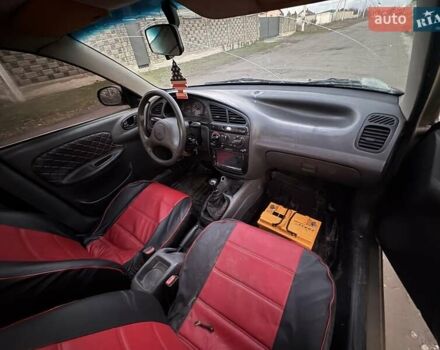 Бежевый Дэу Ланос, объемом двигателя 0 л и пробегом 200 тыс. км за 2000 $, фото 6 на Automoto.ua