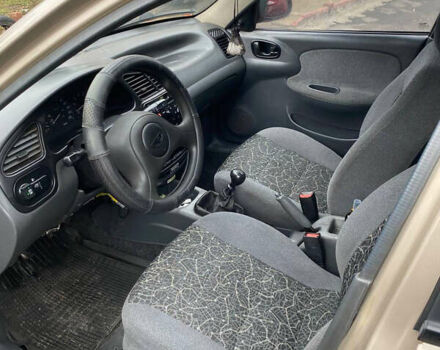 Бежевый Дэу Ланос, объемом двигателя 1.5 л и пробегом 168 тыс. км за 2200 $, фото 5 на Automoto.ua