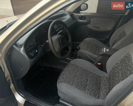 Бежевый Дэу Ланос, объемом двигателя 1.5 л и пробегом 234 тыс. км за 3350 $, фото 8 на Automoto.ua