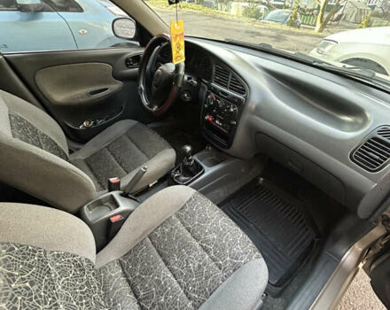 Бежевый Дэу Ланос, объемом двигателя 1.5 л и пробегом 300 тыс. км за 1950 $, фото 6 на Automoto.ua