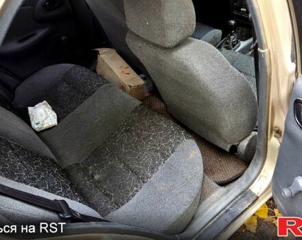 Бежевий Деу Ланос, об'ємом двигуна 1.6 л та пробігом 273 тис. км за 800 $, фото 3 на Automoto.ua