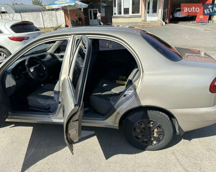 Бежевый Дэу Ланос, объемом двигателя 1.5 л и пробегом 183 тыс. км за 2300 $, фото 4 на Automoto.ua