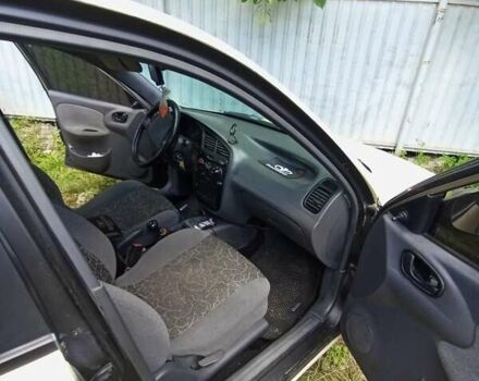 Бежевый Дэу Ланос, объемом двигателя 1.6 л и пробегом 290 тыс. км за 2950 $, фото 4 на Automoto.ua