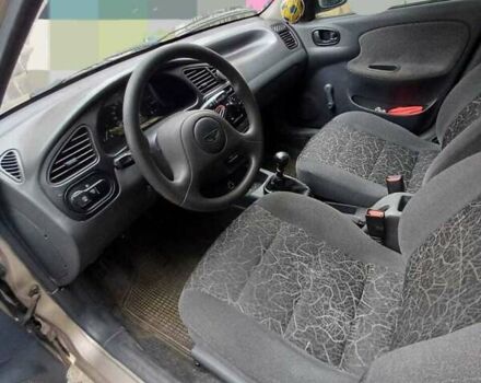 Бежевый Дэу Ланос, объемом двигателя 1.39 л и пробегом 150 тыс. км за 1800 $, фото 3 на Automoto.ua