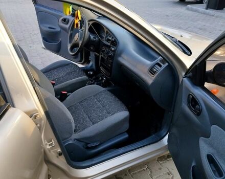 Бежевый Дэу Ланос, объемом двигателя 1.5 л и пробегом 245 тыс. км за 1900 $, фото 2 на Automoto.ua