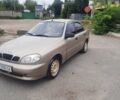 Бежевый Дэу Ланос, объемом двигателя 1.5 л и пробегом 230 тыс. км за 2400 $, фото 1 на Automoto.ua