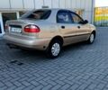 Бежевый Дэу Ланос, объемом двигателя 15 л и пробегом 244 тыс. км за 2500 $, фото 1 на Automoto.ua