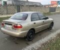 Бежевый Дэу Ланос, объемом двигателя 0 л и пробегом 200 тыс. км за 2000 $, фото 5 на Automoto.ua