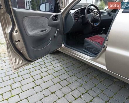 Бежевий Деу Ланос, об'ємом двигуна 1.5 л та пробігом 210 тис. км за 2750 $, фото 7 на Automoto.ua