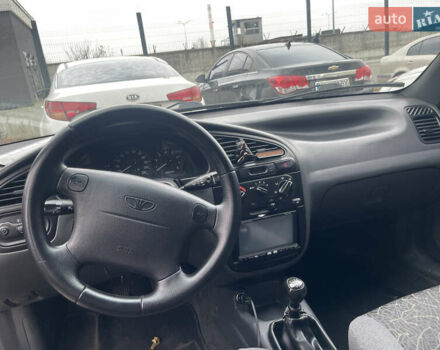 Бежевый Дэу Ланос, объемом двигателя 1.5 л и пробегом 207 тыс. км за 3400 $, фото 6 на Automoto.ua