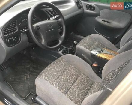Бежевий Деу Ланос, об'ємом двигуна 1.6 л та пробігом 183 тис. км за 2700 $, фото 4 на Automoto.ua