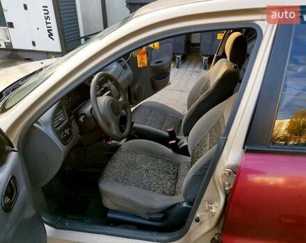 Бежевый Дэу Ланос, объемом двигателя 1.5 л и пробегом 245 тыс. км за 1900 $, фото 4 на Automoto.ua