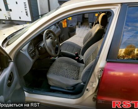 Бежевый Дэу Ланос, объемом двигателя 1.5 л и пробегом 245 тыс. км за 1900 $, фото 5 на Automoto.ua