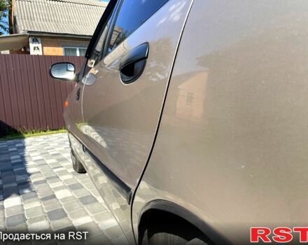 Бежевый Дэу Ланос, объемом двигателя 1.5 л и пробегом 186 тыс. км за 2750 $, фото 6 на Automoto.ua